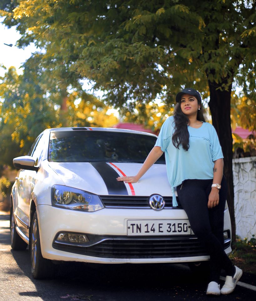 Aarthi subash infront of car