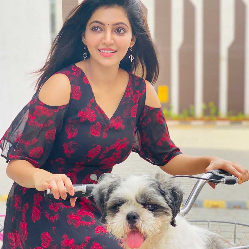 Athulya with her pet